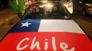 Jalan kota menjadi ajang perayaan fans Cile saat timnya menang atas Argentina  pada laga Final Copa America Centenario 2016 di Vina del Mar, Cile (27/6/2016). (REUTERS/Rodrigo Garrido)