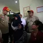 Menteri Sosial Sosial Juliari P. Batubara mengunjungi Keluarga Korban dan lokasi kejadian hanyutnya siswa SMPN 1 Turi yang berkegiatan susur sungai sempor di Sleman, Sabtu (22/2).