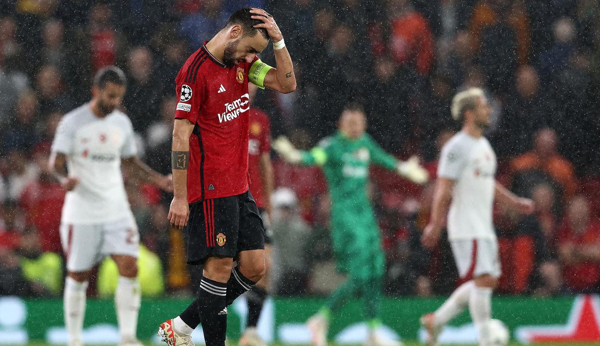Manchester United yang berlaga di Grup A menderita dua kekalahan dari Bayern Munchen dan Galatasaray. Pada matchday pertama MU yang bertandang ke markas Bayern Munchen (21/9/2023) kalah 3-4. Sementara pada matchday kedua saat menjamu Galatasaray (4/10/2023) Setan Merah kembali menelan kekalahan 2-3. (AFP/Darren Staples)