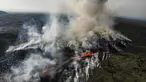 Foto udara yang diambil pada 10 Juli 2023 ini menunjukkan asap mengepul dari lahar yang mengalir selama letusan gunung berapi di dekat Litli Hrutur, barat daya Reykjavik di Islandia. (AFP/Kristinn Magnusson/Iceland Out)