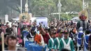 Marching band dan kesenian trdisional ondel-ondel meramaikan pawai Deklarasi Kampanye Damai di Monas, Minggu (23/9). (Merdeka.com/Iqbal Nugroho)