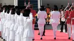 Tim Purna Paskibraka 2023 membawa duplikat bendera Merah Putih dan naskah teks proklamasi berjalan masuk ke pesawat TNI AU dalam acara kirab bendera Merah Putih dan naskah teks proklamasi menuju Ibu Kota Nusantara (IKN) di Base Ops Lanud Halim Perdanakusuma, Jakarta, Sabtu (10/8/2024). (Yasuyoshi CHIBA / AFP)