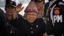 Wakil Presiden Ma'ruf Amin dengan mengenakan pakaian adat Palembang tiba untuk menghadiri Sidang Tahunan MPR, Sidang Bersama DPR dan DPD tahun 2024 di kompleks Parlemen, Senayan, Jakarta, Jumat (16/8/2024). (Yasuyoshi CHIBA / AFP)