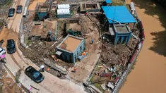 Foto dari udara menunjukkan rumah-rumah yang rusak akibat banjir di Kota Bifeng, Provinsi Guizhou, China, Sabtu (13/6/2020). Banjir yang dipicu oleh hujan telah berdampak pada kehidupan 700.000 orang di Provinsi Guizhou. (Xinhua/Liu Xu)