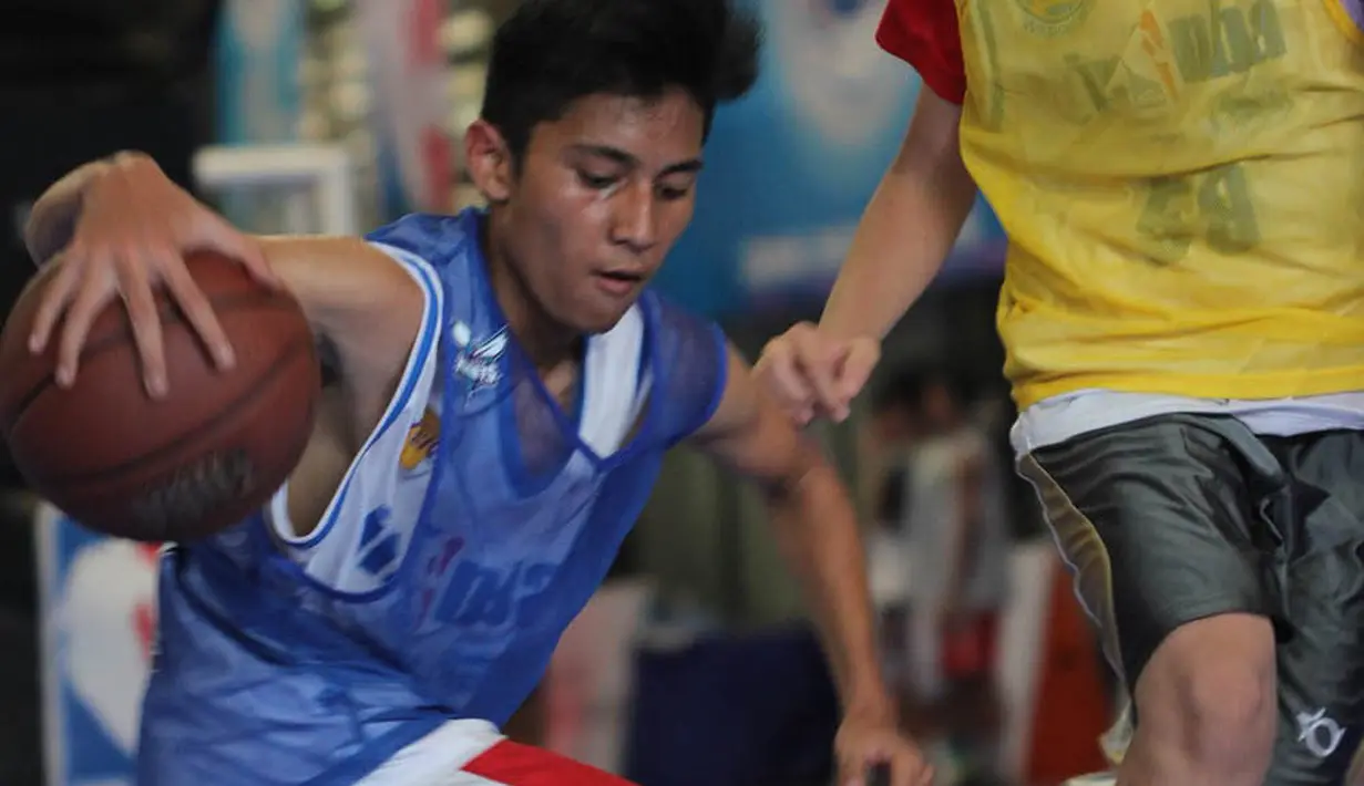 Peserta antusias menunjukan bakatnya pada tahap Selection Camp Junior NBA. Acara yang diadakan bekerjasama dengan Frisian Flag itu menerapkan nilai-nilai utama Junior NBA yakni sportivitas, kerjasama, sikap positif dan saling menghargai. (Istimewa)