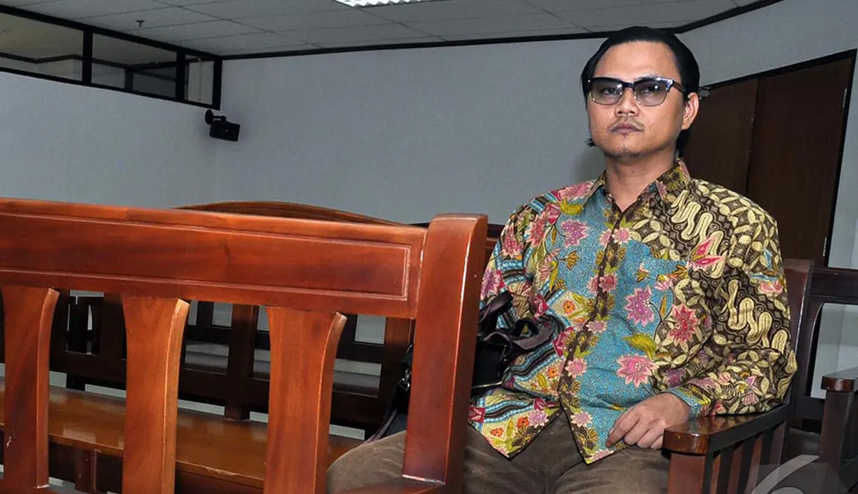 Terdakwa kasus korupsi pengadaan videotron Riefan Avrian di Pengadilan Tipikor, Jakarta, Kamis (9/10/2014) (Liputan6.com/Miftahul Hayat)