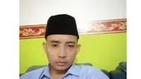 Foto bacaleg NasDem dari Dapil V Tuban atas nama Trisno yang disebut-sebut melakukan penggelapan dua unit mobil. (Liputan6.com/ Ahmad Adirin)