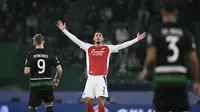 Selebrasi pemain Arsenal ketika mencukur Sporting di Liga Champions (AFP)