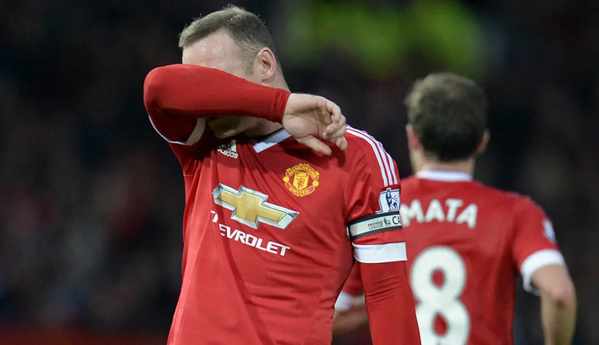 Kini, Wayne Rooney berhasil menembus "Klub 500" MU yang hanya bisa diraih oleh sembilan pemain antara lain, Ryan Giggs, Paul Scholes dan Sir bobby Carlton. (AFP/Oli Scarff)