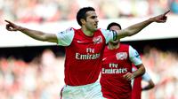 1. Robin van Persie. Mencetak 144 gol dalam 280 penampilannya bersama 2 klub, Arsenal (2004-2012) dan Manchester United (2012-2015). (AP Photo/Bogdan Maran)