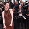 Qi Wei berpose di karpet merah Festival Film Cannes 2026. (dok. Sameer AL-DOUMY / AFP)