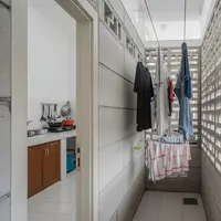 Inspirasi Area Jemuran dengan Roster Rumah Type 36. (Foto: AI)