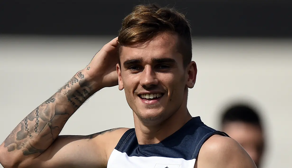 Antoine Griezmann pada tahun 2014 saat mengikuti sesi latihan bersama tim Prancis pada ajang Piala Dunia FIFA 2014 di Stadion Santa Cruz, Ribeirao Preto, Brasil. (Photo by Franck Fife / AFP)