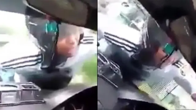 Tak Terima Diputusin, Pria Nekat Panjat Mobil Pacarnya Sambil Mewek