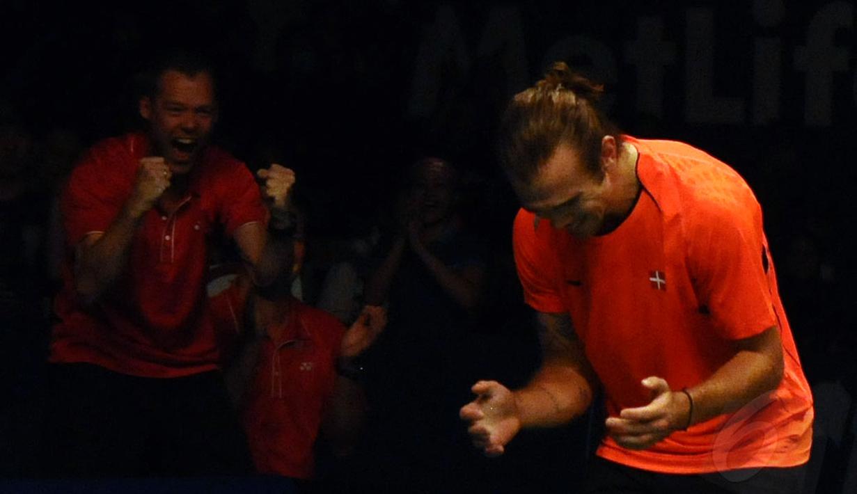 Juara tunggal putra Indonesia Open 2014 diraih Jan O Jorgensen (Denmark) setelah di final menumbangkan Kenichi Tago (Jepang), (22/6/2014). (Liputan6.com/Helmi Fithriansyah)
