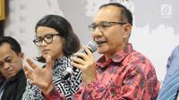 Ketua Satgas Waspada Investasi Tongam L Tobing menjelaskan tentang fintech di Indonesia, Jakarta, Rabu (12/12). Sedangkang P2P ilegal tidak menjadi tanggung jawab pihak manapun. (Liputan6.com/Angga Yuniar)