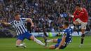 Brighton and Hove Albion vs Manchester United 4-0. Pada partai tunda pekan ke-36 Liga Inggris musim 2021/2022 (7/5/2022) Cristiano Ronaldo bersama Manchester United yang telah kehilangan asa berlaga di Liga Champions Eropa harus menerima kenyataan kalah 0-4 dari tuan rumah Brighton and Hove Albion. Cristiano Ronaldo tampil penuh selama 90 menit namun tak satu pun gol dicetaknya. Sebuah kartu kuning pun diterimanya pada menit ke-45. (AFP/Glyn Kirk)