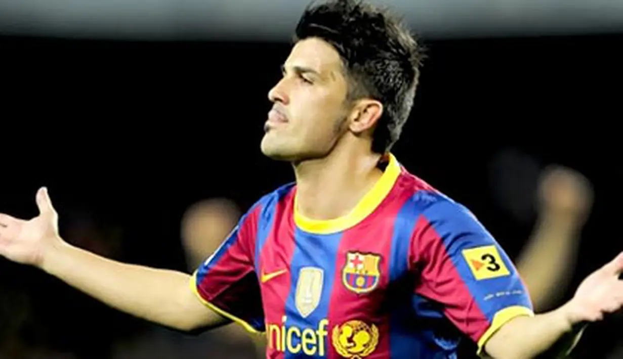 Luapan kegembiraan David Villa setelah menyumbang dua gol untuk kemenangan Barcelona yang menundukkan Sevilla 5-0 di Nou Camp, 30 Oktober 2010. AFP PHOTO/JOSEP LAGO
