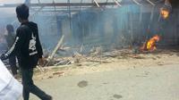 Buol kembali mencekam, 1 rumah terbakar dan 1 balita tewas. (Liputan6.com/Apriawan/Facebook dan Humas Polres Buol)