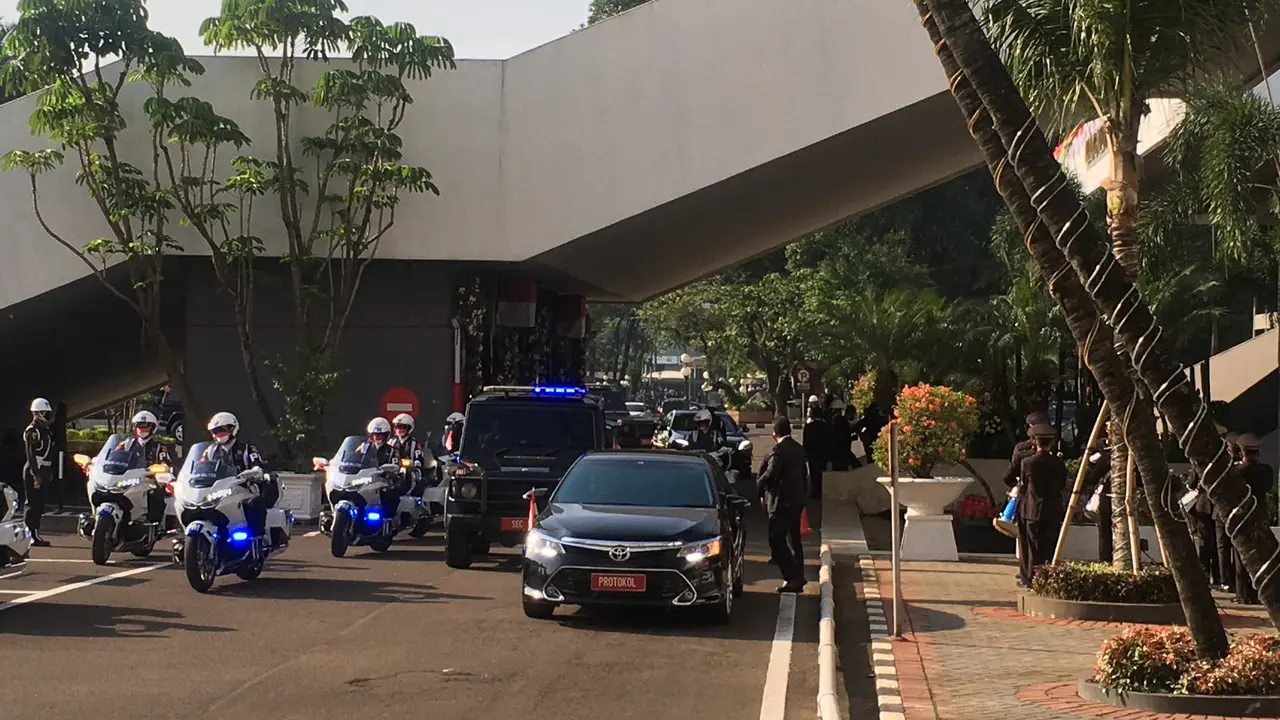 Presiden Jokowi tiba di gedung Parlemen DPR/MPR menghadiri sidang Tahunan hari ini. (Liputan6.com/Delvira Hutabarat)