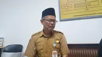 Kepala SMKN 5 Kota Tangsel, Rohmani Yusuf. (Liputan6.com/Pramita Tristiawati)