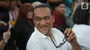 Ekspresi suami komedian Tri Retno Prayudati atau Nunung, July Jan Sambiran saat menghadiri sidang kasus penyalahgunaan narkotika di PN Jakarta Selatan, Rabu (6/11/2019). Sidang pembacaan tuntutan terhadap July Jan Sambiran dan nunung ditunda hingga 13 November 2019. (Liputan6.com/Immanuel Antonius)