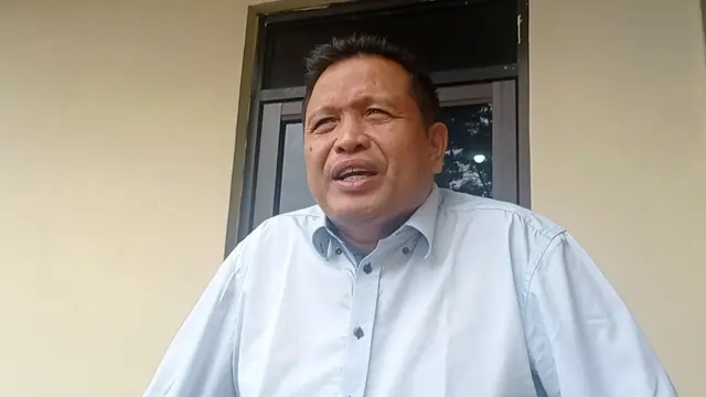 Rusman Emba, Bupati Muna saat di Polda Sultra.(Liputan6.com/Ahmad Akbar Fua)
