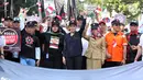 Ketua Umum KPRI Rieke Diah Pitaloka bersama ribuan buruh turun ke jalan saat menggelar karnaval dan deklarasi dalam peringatan Hari Buruh Sedunia, Jakarta, Selasa (1/5). (Liputan6.com/JohanTallo)