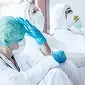 Ilustrasi para tenaga medis kelelahan perangi pandemi covid-19 (Liputan6.com / Abdillah)