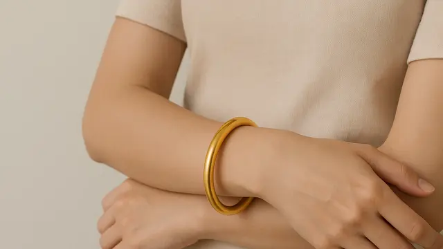 Model Gelang Emas 24 Karat Desain Simpel yang Lagi Ngetren 2025/AI