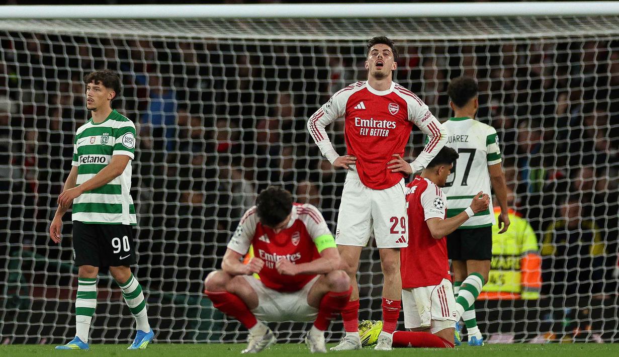 Hasil ini sekaligus memastikan Arsenal kembali menembus empat besar untuk dua musim berturut-turut. Tampak dalam foto, ekspresi gelandang Arsenal asal Jerman bernomor punggung 29, Kai Havertz, setelah pertandingan leg kedua perempat final Liga Champions 2025/2026 melawan Sporting CP di Stadion Emirates, London Utara pada Rabu 15 April 2026 waktu setempat atau Kamis (16/4/2026) dini hari WIB. (Adrian Dennis/AFP)