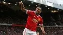 Anthony Martial merayakan gol yang dicetaknya ke gawang Liverpool di Stadion Old Trafford, Inggris. Sabtu (12/9/2015). (Action Images via Reuters/Carl Recine)