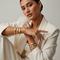 Model gelang bangle emas kuning tren 2026. [Foto: Gemini]