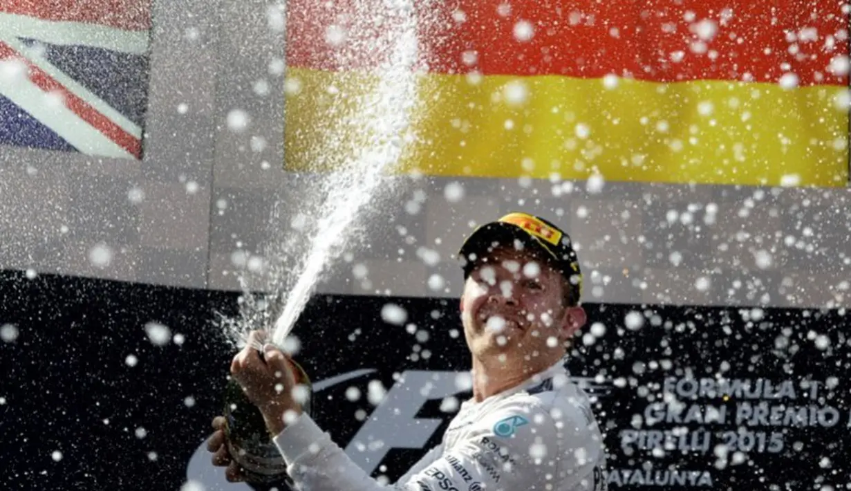 Semprotan sampanye Rosbergi podium juara. (AFP/Tom Gandolfini)