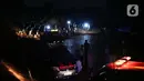 Suasana area pemakaman khusus protokol COVID-19 di TPU Pondok Ranggon, Jakarta, Kamis (24/9/2020). Pada Kamis (24/9), ada 128 pasien tutup usia setelah sebelumnya dinyatakan positif virus corona, sehingga jumlah pasien meninggal dunia saat ini menjadi 10.105 orang. (Liputan6.com/Helmi Fithriansyah)