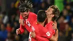 Penyerang Atletico Madrid, Antoine Griezmann (kanan) merayakan gol kedua timnya saat pertandingan sepak bola Liga Spanyol melawan Getafe CF di stadion Coliseum Alfonso Perez, Getafe, 15 Mei 2024. (JAVIER SORIANO/AFP)