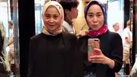 Tersangka kasus penipuan preorder iPhone Si Kembar Rihana dan Rihani.(Tangkapan layar akun Twitter @mazzini_gsp)
&nbsp;