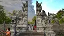 Warga melihat semburan abu vulkanik Gunung Agung di Kecamatan Kubu, Karangasem, Bali, Minggu (26/11). Semburan asap dan abu vulkanik Gunung Agung mencapai ketinggian 1.500 meter dari puncak Gunung Agung. (AFP/Sonny Tumbelaka)
