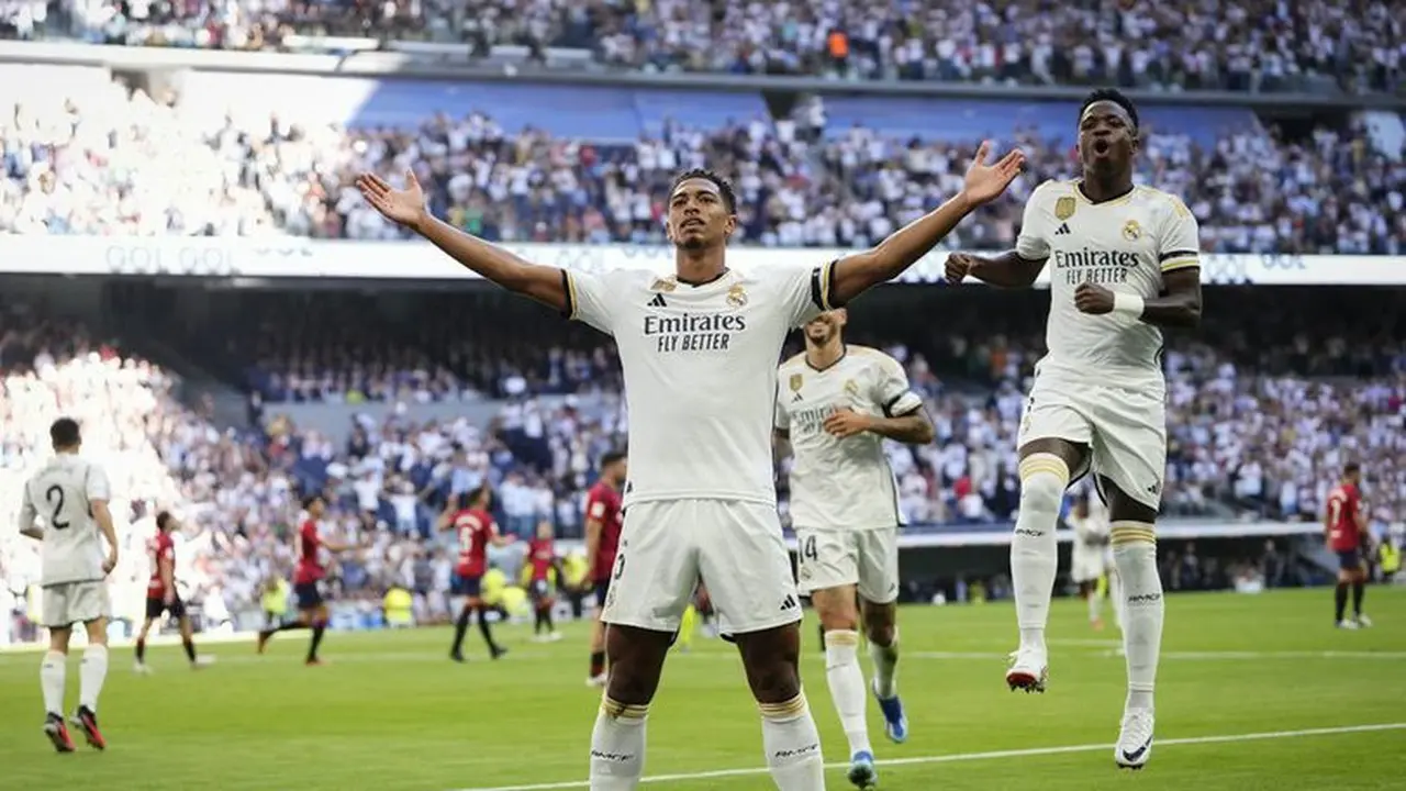 Jude Bellingham mencetak gol pada laga Real Madrid vs Osasuna di La Liga musim 2023/2024 (c) AP Photo/Jose Breton