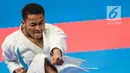 Karateka Indonesia, Ahmad Zigi Zaresta, tampil pada nomor kata cabang karate Asian Games XVIII di JCC Senayan, Jakarta, Sabtu (25/8/2018). Dirinya berhasil meraih medali perunggu. (Bola.com/Vitalis Yogi Trisna)