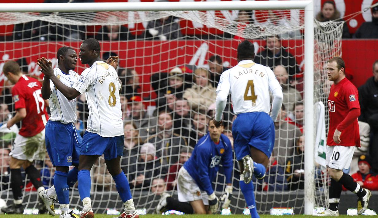 Namun, Ferdinand gagal membendung penalti Sulley Muntari, dan Setan Merah menelan kekalahan 0-1. Kekalahan itu menjadikan asa Manchester United meraih treble, harus sirna. (Foto: AP/Jon Super)