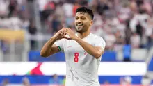 Empat gol tercipta dalam pertandingan ini melalui dua gol Elijah Just untuk Selandia Baru serta gol Ramin Rezaeian dan Mohammad Mohebi untuk Iran. (AP Photo/Mark J. Terrill)