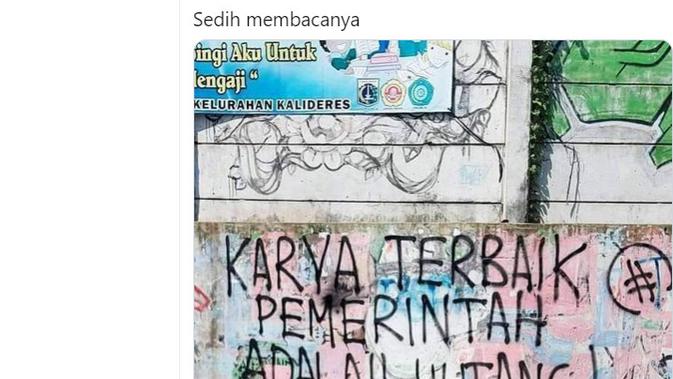 penelusuran  Presiden Jokowi berfoto di depan tembok bertuliskan 