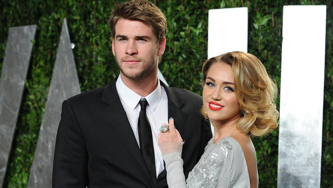 Miley Cyrus dan Liam Hemsworth (AFP/Bintang)