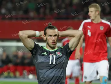 Tim nasional Wales bermain 2-2 dengan Austria pada laga Kualifikasi Piala Dunia 2018 di Stadion Ernst Happel, Wina, Jumat (7/10/2016) dini hari WIB. Gareth Bale gagal menyumbang gol. (Bola.com/Reza Khomaini)