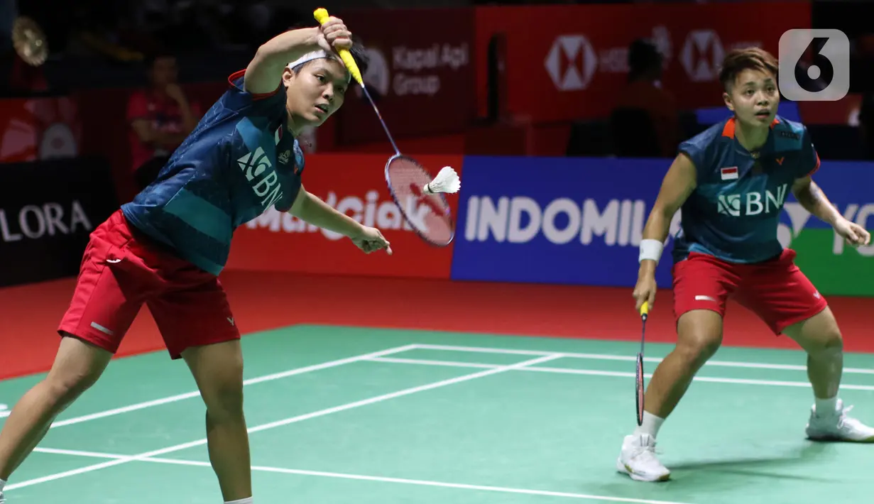 Apriyani Rahayu/Siti Fadia menang 26-24, 21-16 atas Efler/Lohau dalam waktu 50 menit. (Liputan6.com/Helmi Fithriansyah)