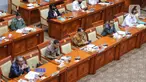 Ketua Kompolnas/Menkopolhukam,  Mahfud MD bersama Ketua Komnas HAM Ahmad Taufan Damanik dan Ketua LPSK Hasto Atmojo Suroyo mengikuti Rapat Dengar Pendapat (RDP) bersama Komisi III DPR di Kompleks Parlemen, Senayan, Jakarta, Senin (22/8/2022). RDP tersebut membahas mengenai kasus penembakan Brigadir J yang melibatkan mantan Kadiv Propam Polri Irjen Ferdy Sambo. (Liputan6.com/Angga Yuniar)