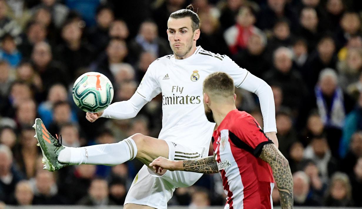 Gareth Bale - Bersama Benzema dan Cristiano Ronaldo mereka membentuk trio BBC yang fantastis dan membawa Real Madrid berjaya di Liga Champions. Bale sendiri telah membukukan 16 gol dalam 55 pertandingan Liga Champions bersama Los Blancos. (AFP/Javier Soriano)