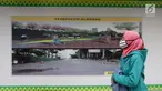 Seorang wanita melintasi lokasi pembangunan Spot Budaya di Dukuh Atas, Jakarta, Selasa (14/5/2019). Pembangunan Spot Budaya tersebut dilakukan guna menciptakan ruang ekspresi budaya di Ibu Kota. (Liputan6.com/Johan Tallo)