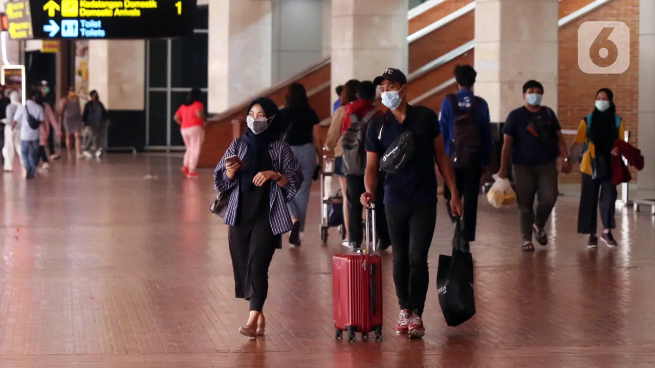 FOTO: Libur Panjang, Bandara Soetta Dipenuhi Penumpang